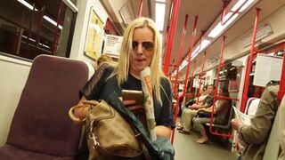 Chasing a blonde in pantyhose and secretly shooting her legs on the subway on the camera